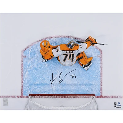 Juuse Saros Nashville Predators Autographed 16" x 20" White Jersey Overhead Making Save Photograph