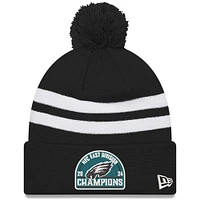 Men's New Era  Black Philadelphia Eagles 2024 NFC East Division Champions Striped Cuffed Knit Hat with Pom