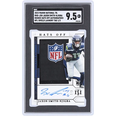 Jaxon Smith-Njigba Seattle Seahawks Autographed 2023 Panini National Treasures NFL Shield Laundry Tag Rookie Hats Off Autograph #RHO-JSN #1/3 SGC Authenticated 9.5 Rookie Card