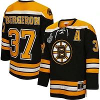 Men's Mitchell & Ness Patrice Bergeron Black Boston Bruins  2010 Alternate Captain Patch Blue Line Player Jersey