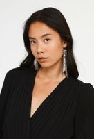 Boucles d'oreilles asymétriques