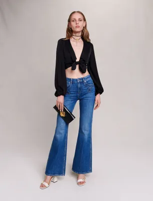 Jean flare à poches brodées