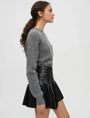 Jupe en cuir évasée à plis