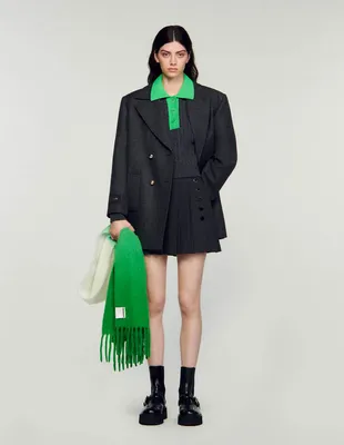 Pull court en maille torsadée