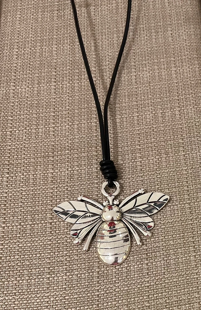 A Leather with charm necklace