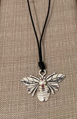 A Leather with charm necklace