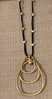 A Leather with charm necklace