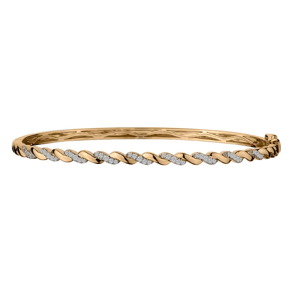 .25 Carat of Diamonds Twist Bangle, 10kt Yellow Gold.......................NOW