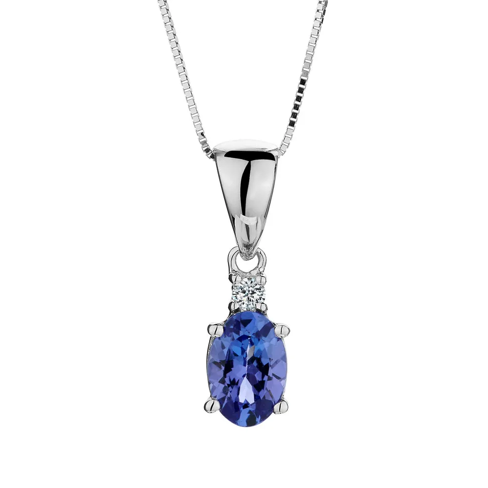 TANZANITE AND .03 CARAT DIAMOND PENDANT, 10kt WHITE GOLD...................NOW