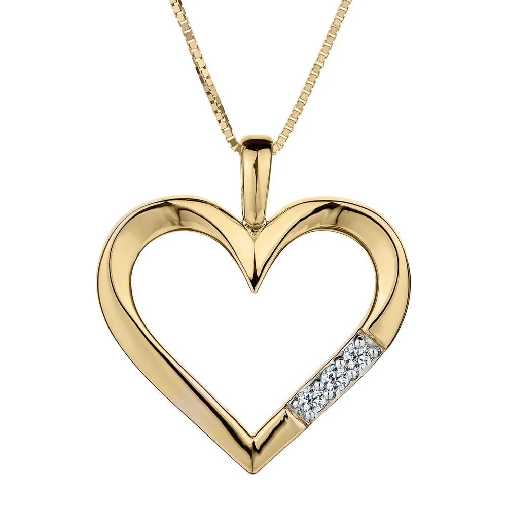 .05 CARAT DIAMOND "PAST PRESENT FUTURE" HEART PENDANT, 10kt YELLOW GOLD, WITH 10kt YELLOW GOLD CHAIN.....................NOW