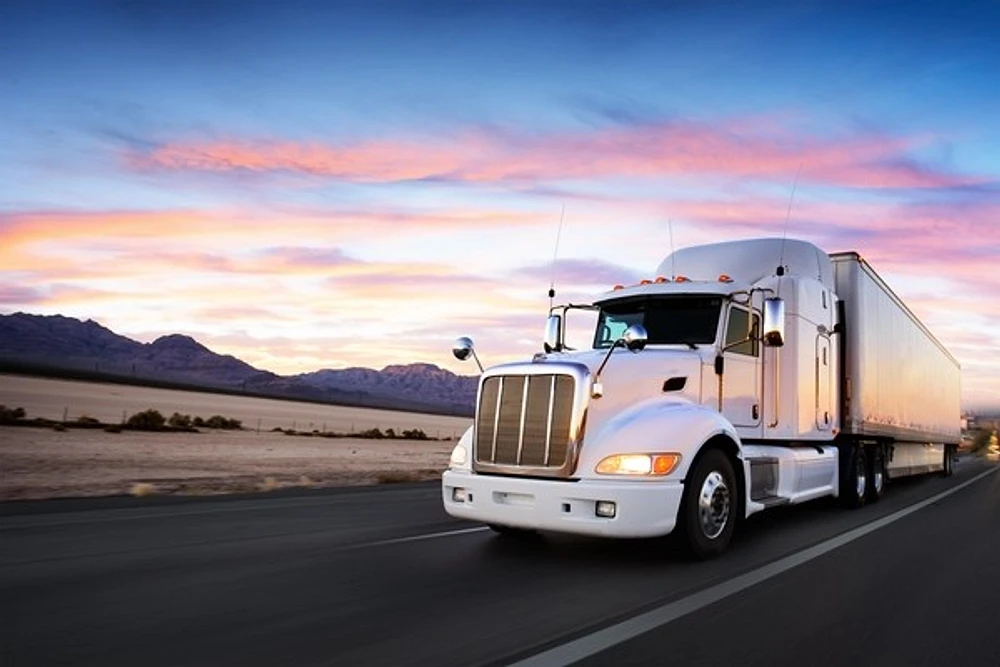 Truck and Highway at Sunset  