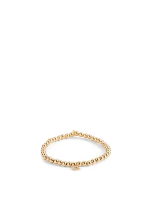 14K Gold Beaded Bracelet With Tiny Diamond Evil Eye Charm