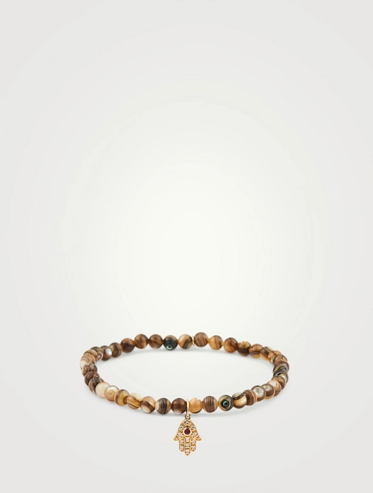Beaded Bracelet With 14K Gold Baby Hamsa Diamond And Ruby Charm