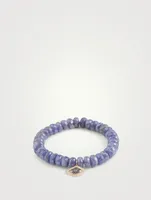 Beaded Bracelet With 14K Gold Small Evil Eye Flower Charm