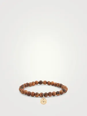 Beaded Bracelet With 14K Gold Diamond Buddha Charm