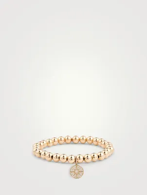 Beaded Bracelet With 14K Gold Diamond Starburst Charm