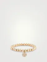 Beaded Bracelet With 14K Gold Diamond Starburst Charm