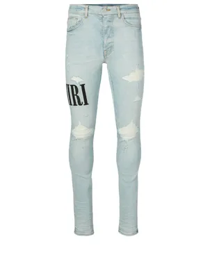 Distressed Skinny Jeans With Logo Embroidery