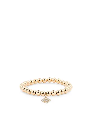 14K Gold Beaded Bracelet With Large Bezel Diamond Evil Eye Charm