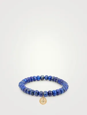 Lapis Beaded Bracelet With Tiny 14K Gold Diamond Sitting Buddha Coin