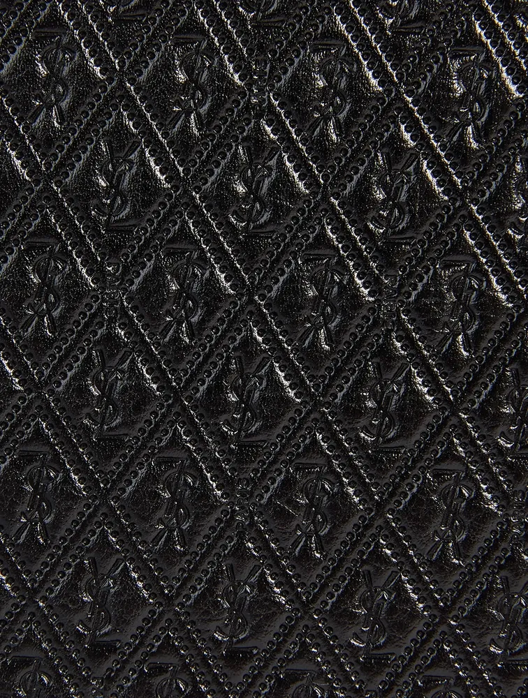 YSL Monogram Embossed Leather Pouch
