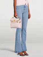 High-Waisted Flare Jeans With Monogram Pockets