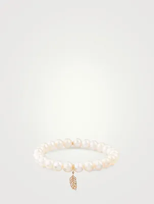 Pearl Bracelet With 14K Gold Diamond Feather Charm