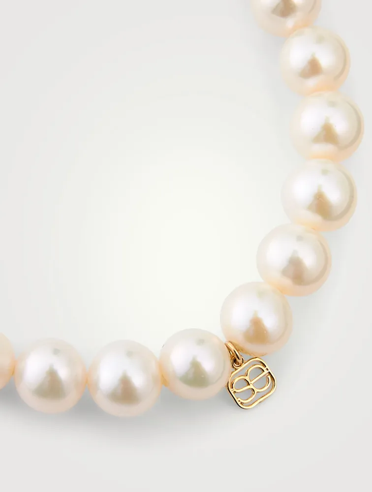 Pearl Bracelet With 14K Gold Diamond Feather Charm