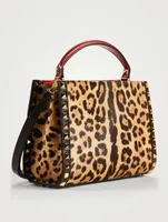 Small Alcove Rockstud Leather Top Handle Bag In Leopard Print