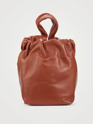 Small Drawstring Leather Clutch Bag