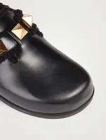 Roman Stud Leather And Shearling Flat Mules