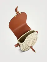 Marcie Raffia And Leather Saddle Bag