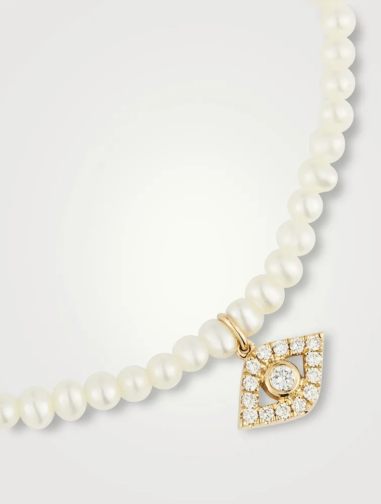 Pearl Bracelet With Large 14K Gold Diamond Evil Eye Charm