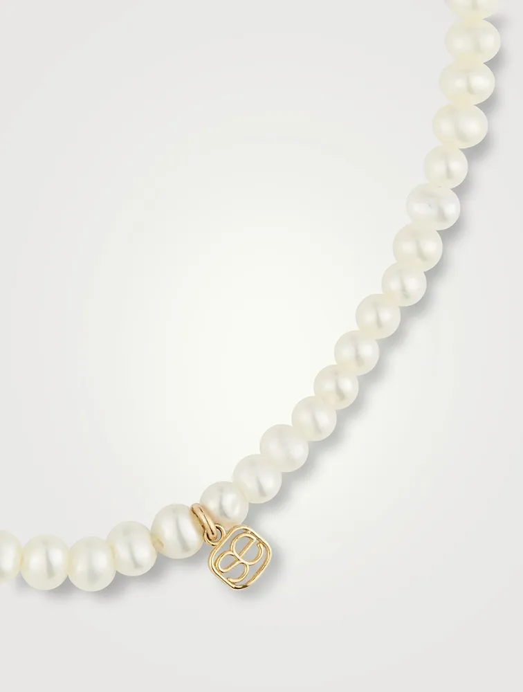 Pearl Bracelet With Large 14K Gold Diamond Evil Eye Charm