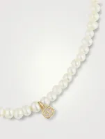 Pearl Bracelet With Large 14K Gold Diamond Evil Eye Charm