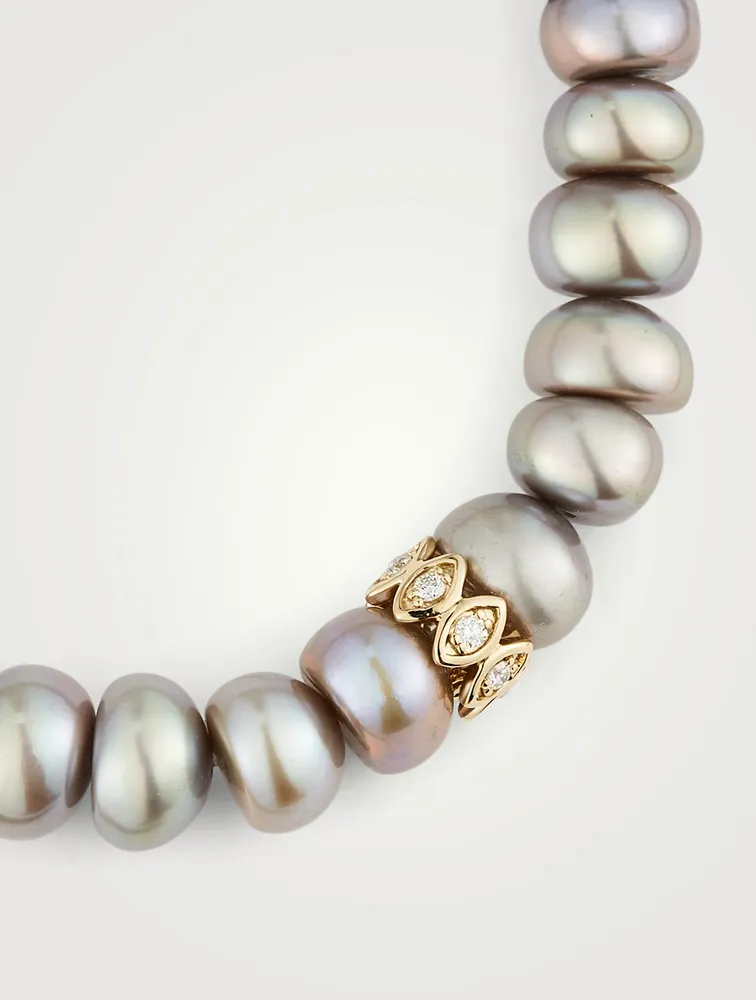 Pearl Bracelet With Large 14K Gold Evil Eye Bead
