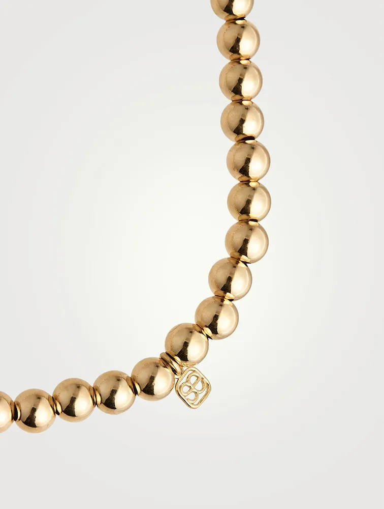 14K Gold Beaded Bracelet With Small 14K Gold Diamond Plumeria Charm