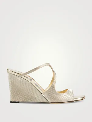 Anise Embossed Metallic Wedge Mules