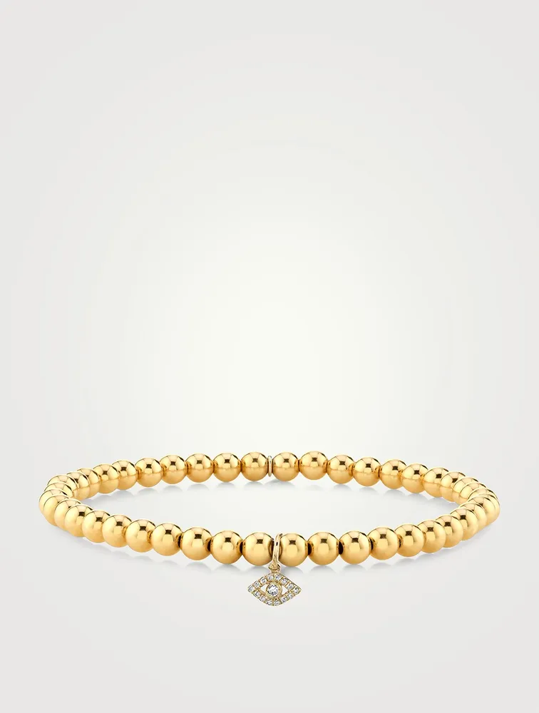 Beaded Bracelet With 14K Gold Tiny Diamond Bezel Evil Eye Charm