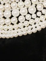 Pearl-Embellished Velvet Halter Gown
