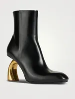 Curved-Heel Leather Ankle Boots