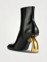 Curved-Heel Leather Ankle Boots