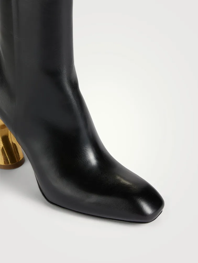 Curved-Heel Leather Ankle Boots