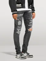 Staggered Logo Skinny Jeans