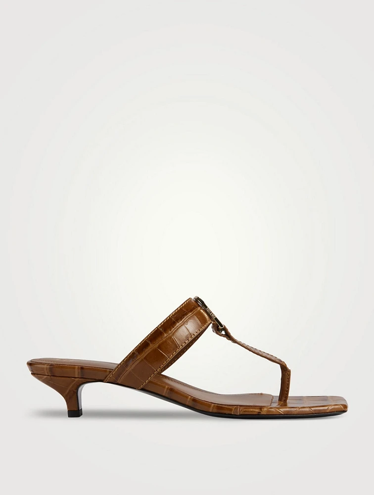 The Belted Croc-Embossed Leather Thong Mules