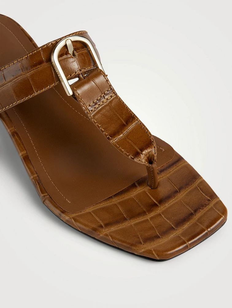 The Belted Croc-Embossed Leather Thong Mules