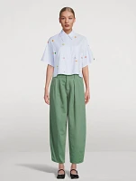 The Pleated Tapered-Leg Trousers