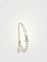 Sleek 18K Gold Akoya Pearl And Diamond Cross Bracelet