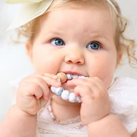 Tiny Teethers Attache-sucette La silicone souple est douce sur les gencives de bébé.