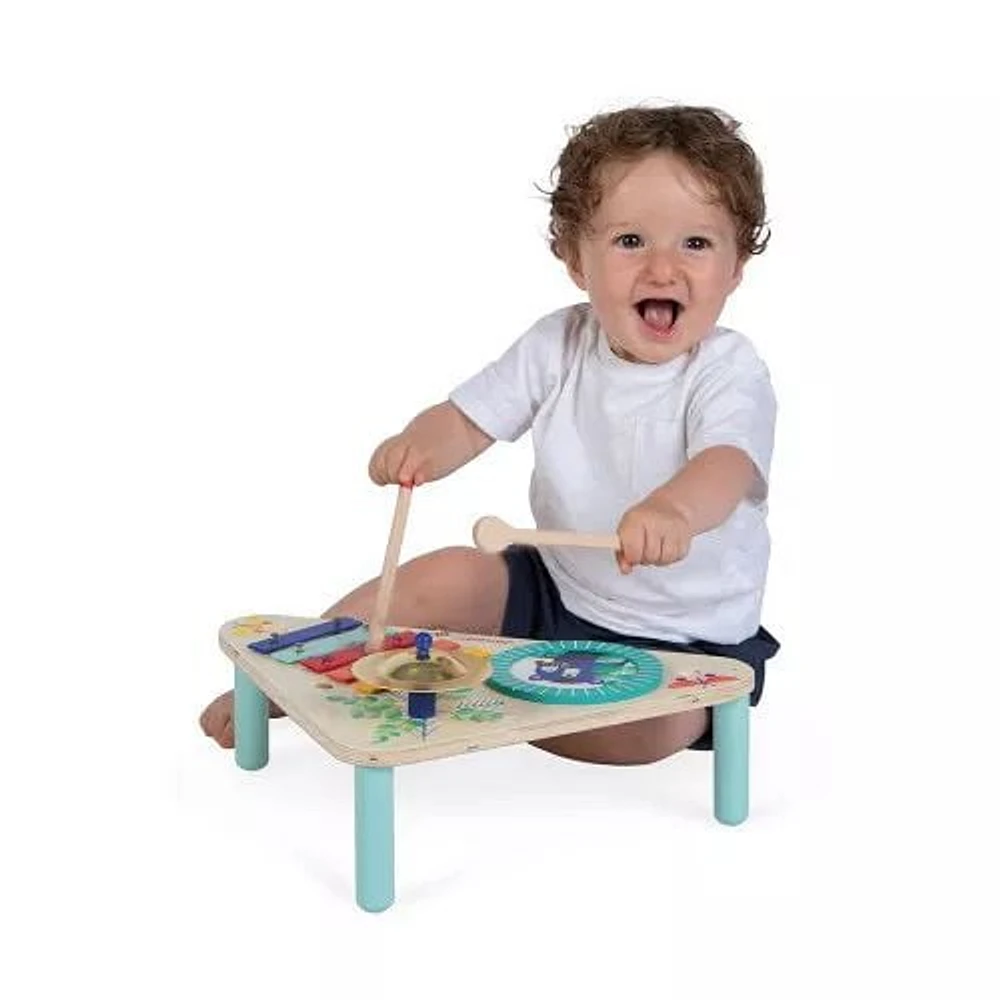 Janod - Table en bois pour enfants - Motif jouets imitation et stimulation musicale - Peinture à l'eau - à partir de 12 mois.